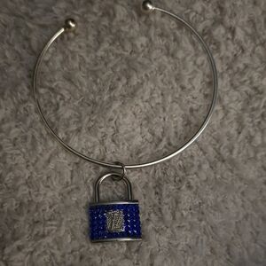 Silver-Tone Bangle Bracelet with Blue Crystal Padlock Charm Lv